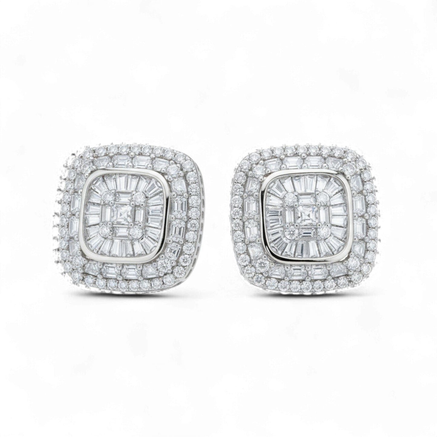 Pair of diamond earrings on a white background