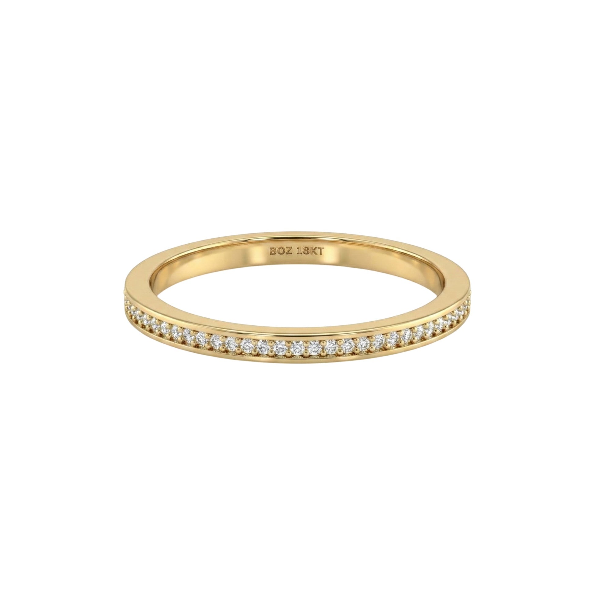 Gold ring with diamonds on a white background