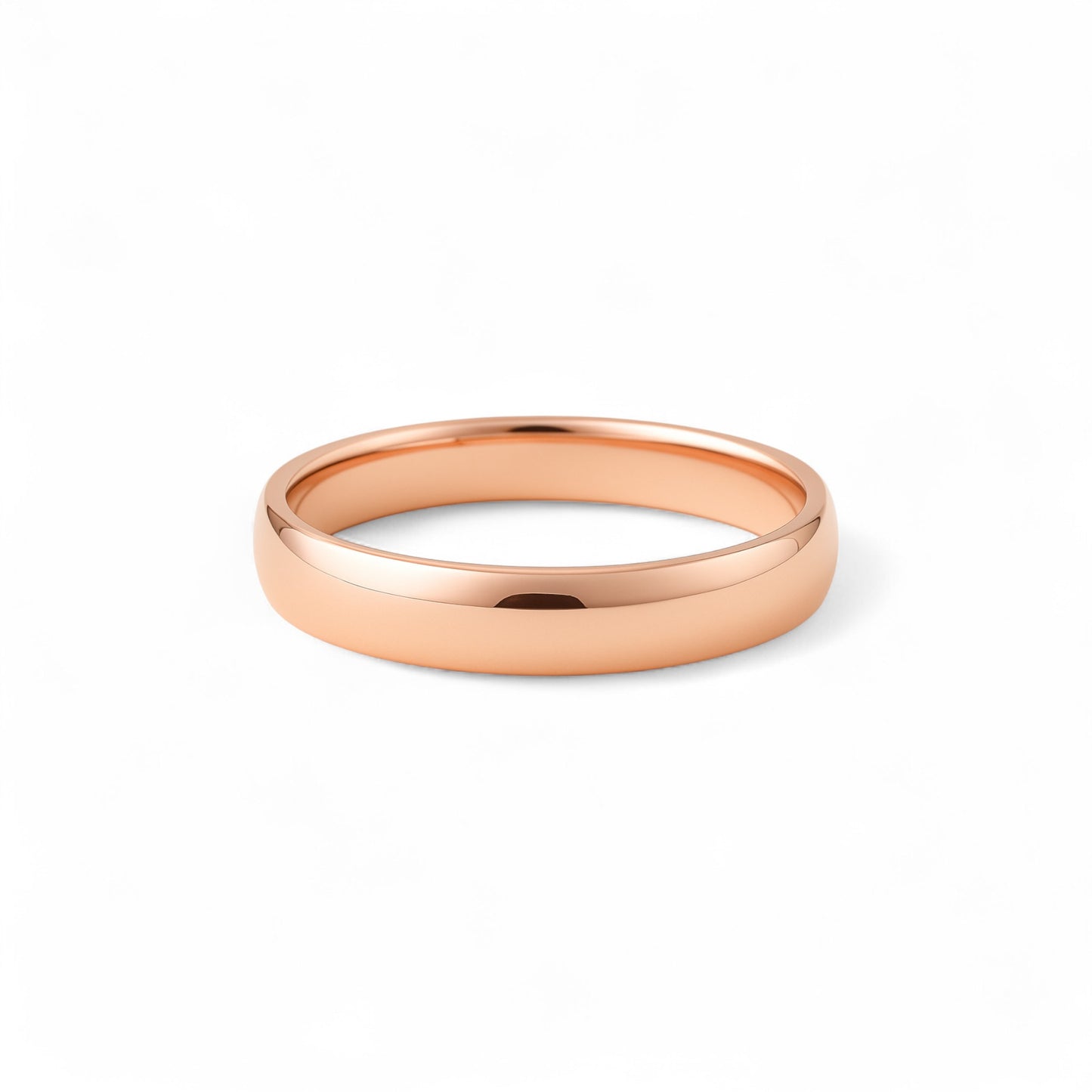 Rose gold ring on a white background