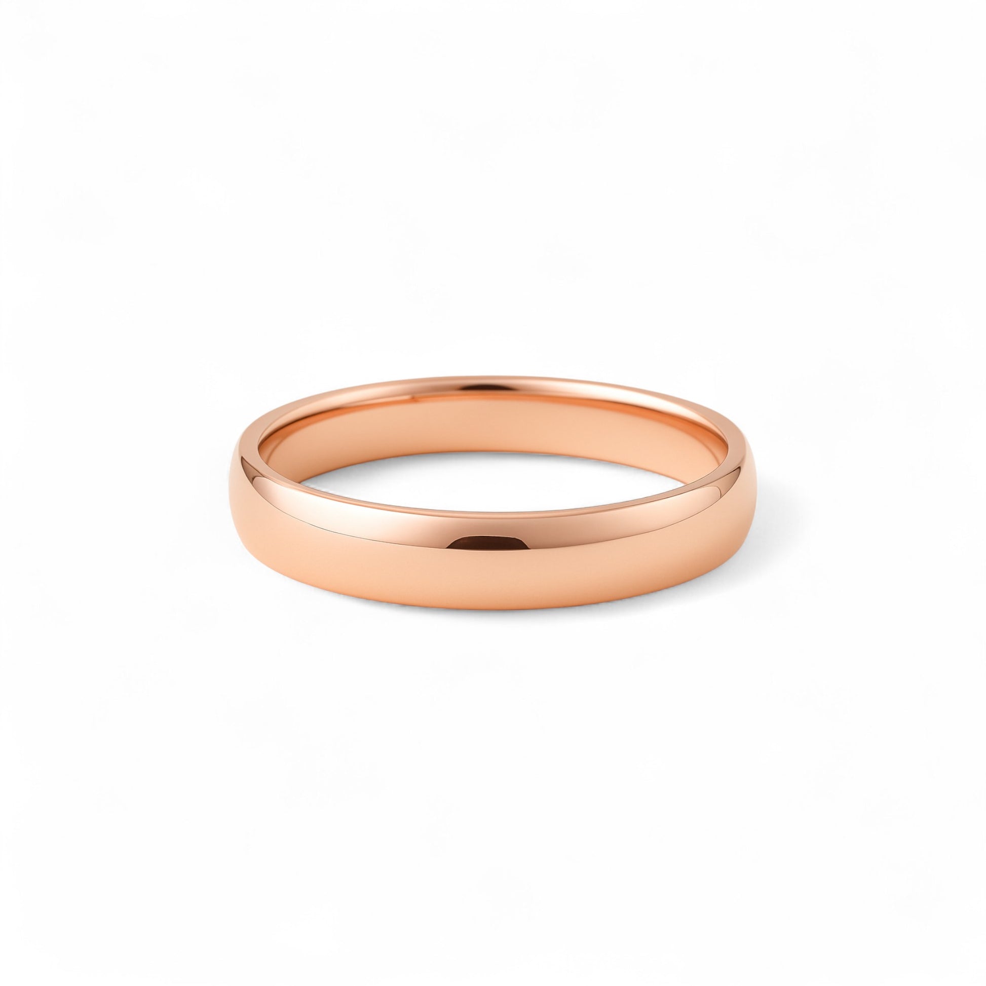 Rose gold ring on a white background
