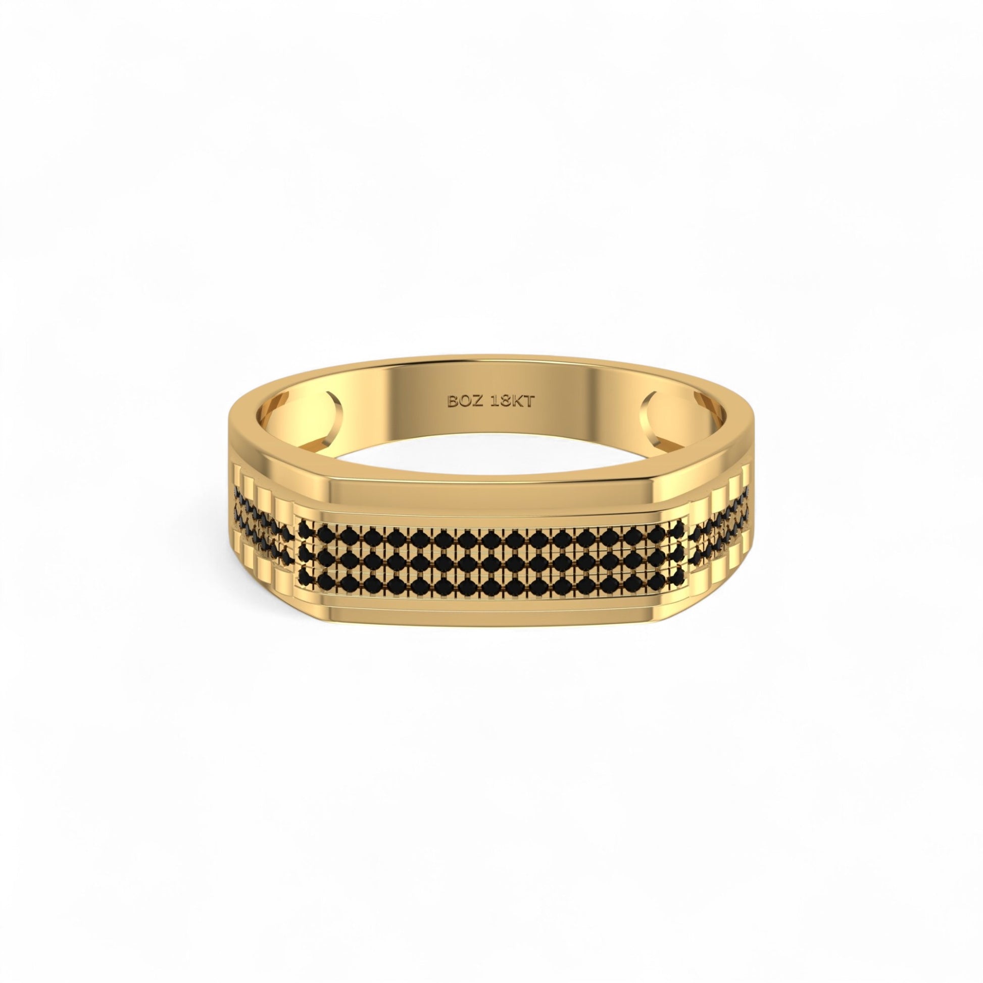 Gold ring with black diamond pattern on a white background