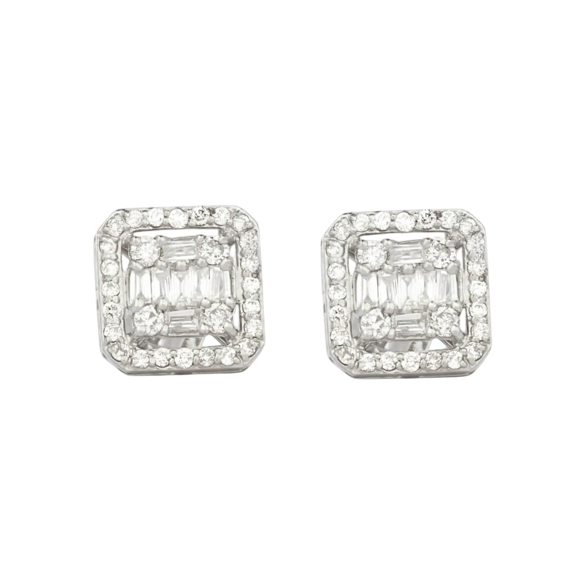 Pair of diamond earrings on a white background