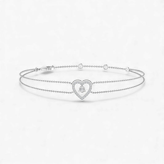Silver bracelet with a heart-shaped clasp on a white background
