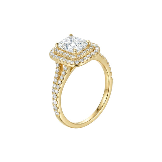 Gold ring with a large central diamond and smaller diamonds on the band against a white background