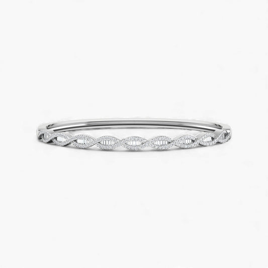 Silver bracelet with intricate design on a white background