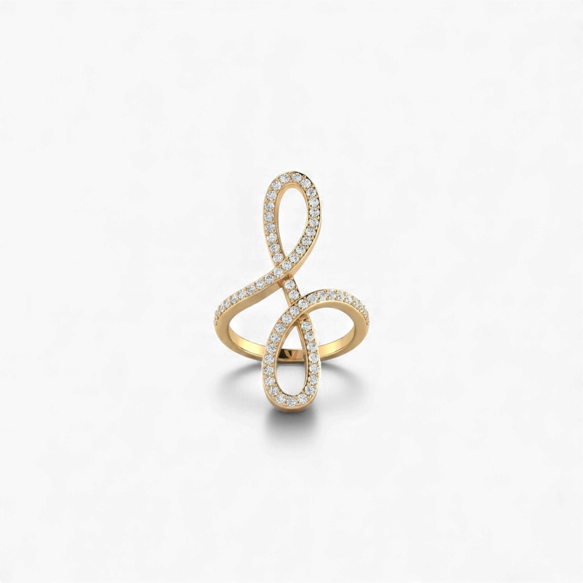 Gold ring with diamond accents on a white background