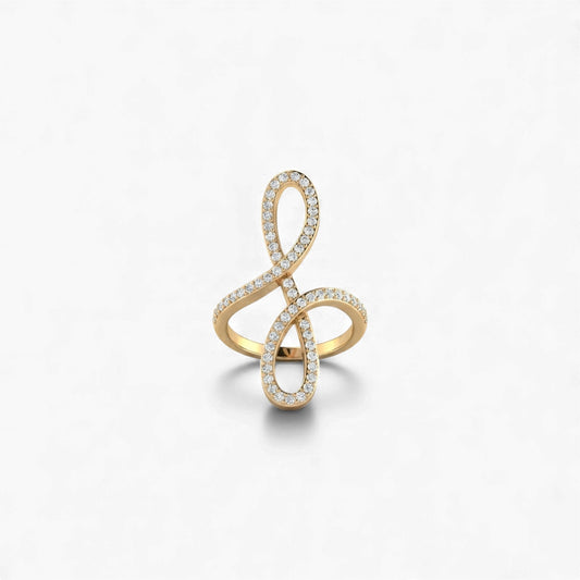 Gold ring with diamond accents on a white background