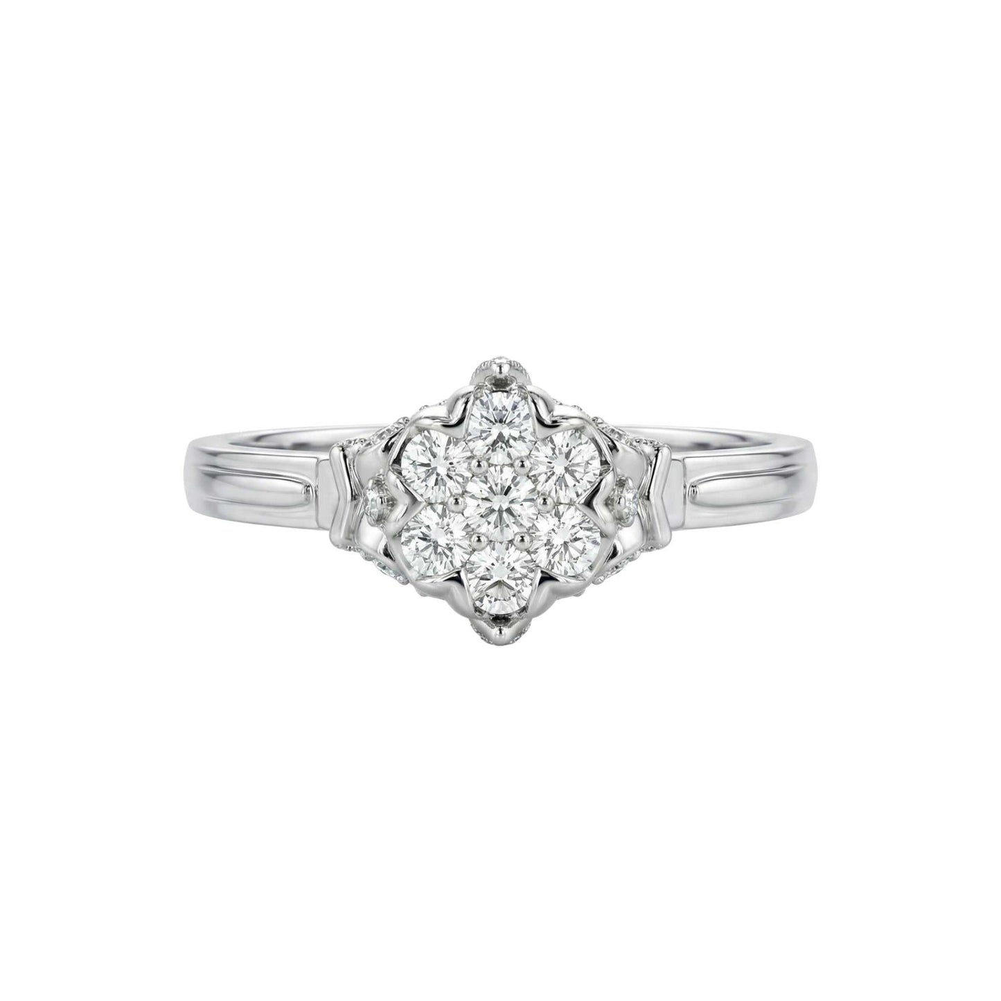 Silver ring with a diamond heart-shaped center on a white background