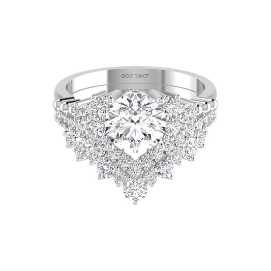 Silver ring with a large central gemstone and smaller stones on a white background