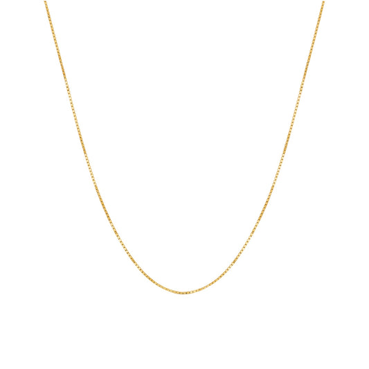 Gold chain necklace on a white background