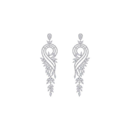 Pair of silver earrings with intricate designs on a white background