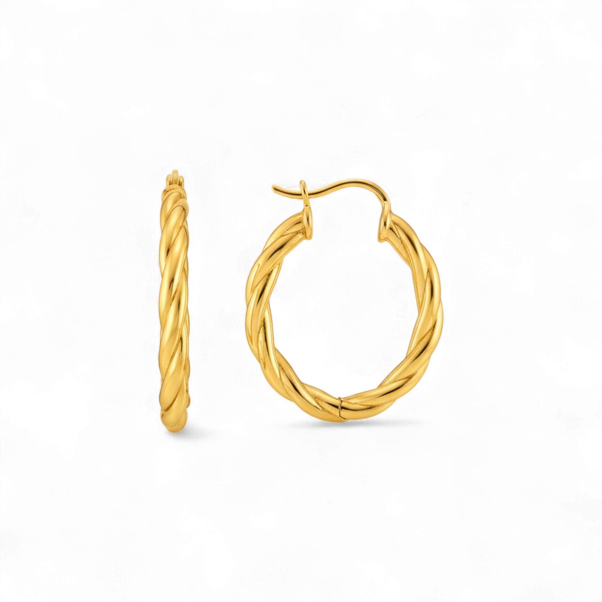 Pair of gold hoop earrings on a white background