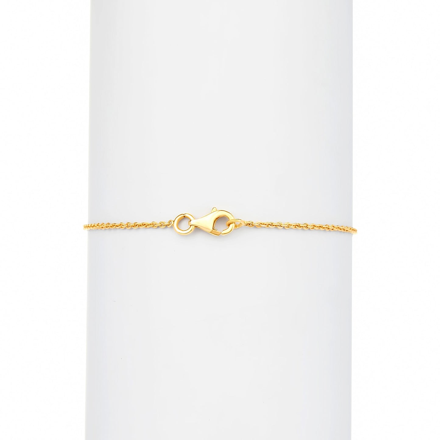 Gold bracelet on a white background