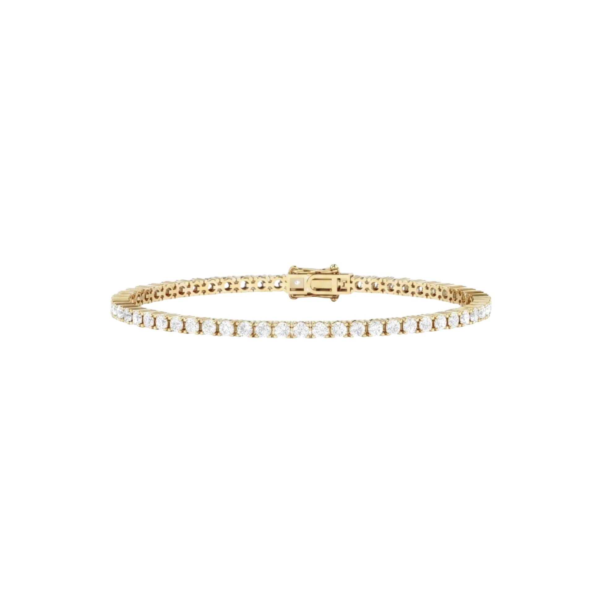 Gold bracelet with diamonds on a white background