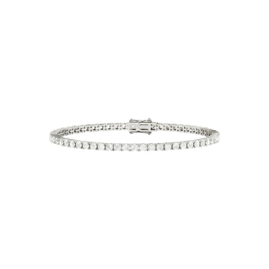 Silver bracelet with clear stones on a white background
