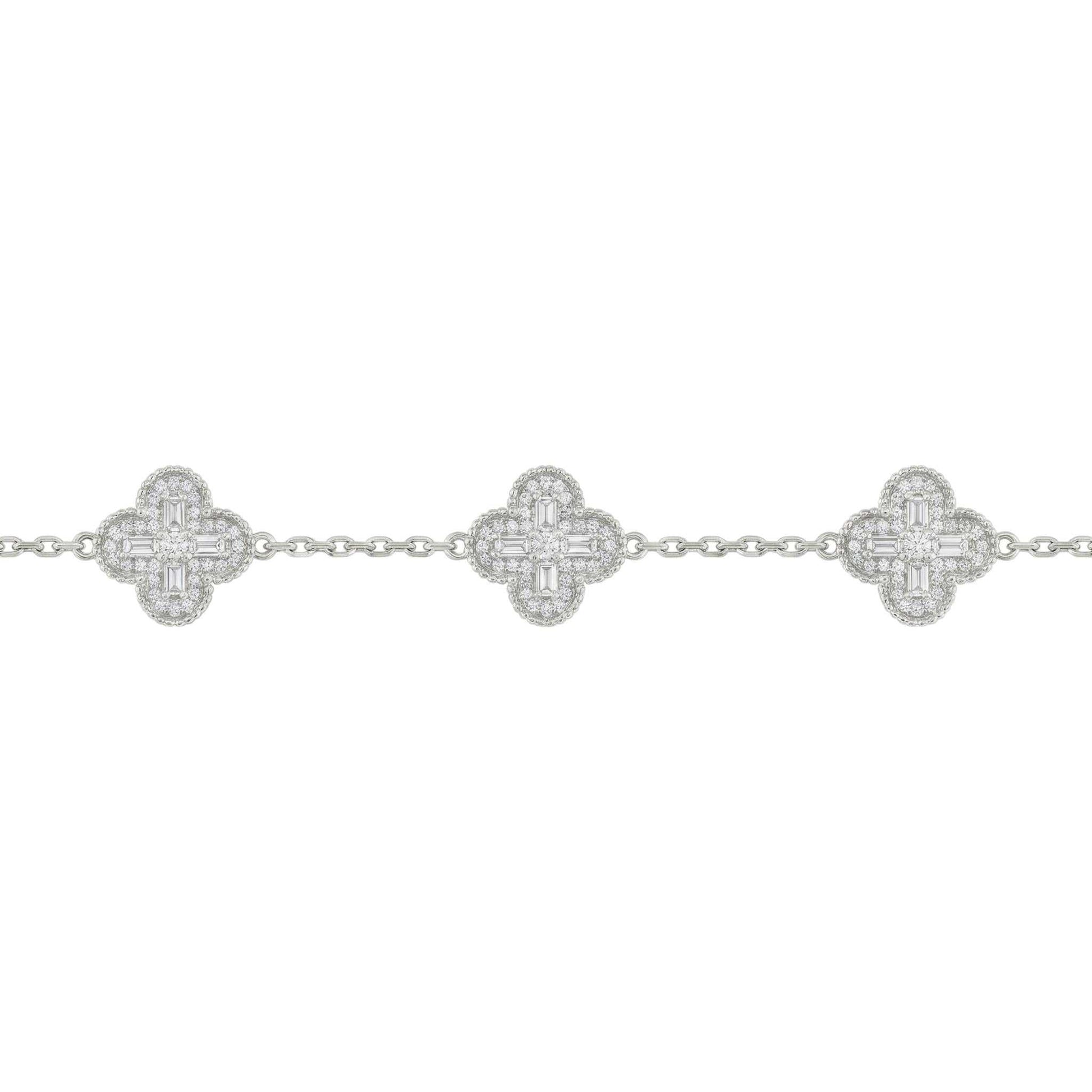 Silver bracelet with clover-shaped links on a white background