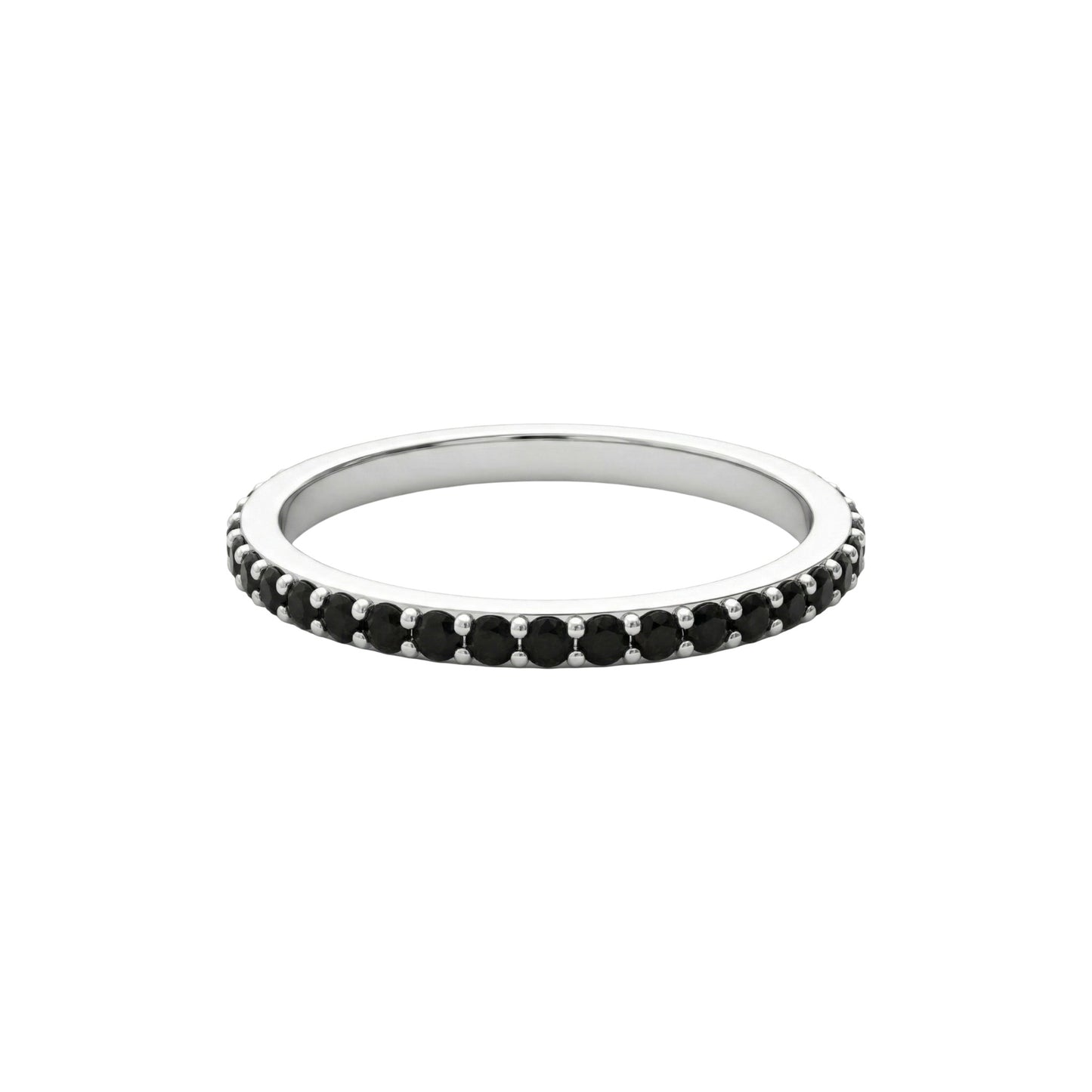 Silver ring with black gemstones on a white background