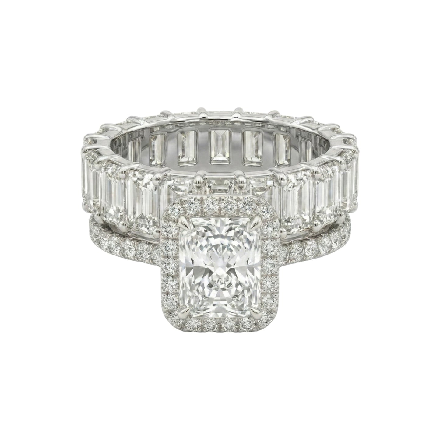 Diamond ring with a square-cut center stone and baguette side stones on a white background