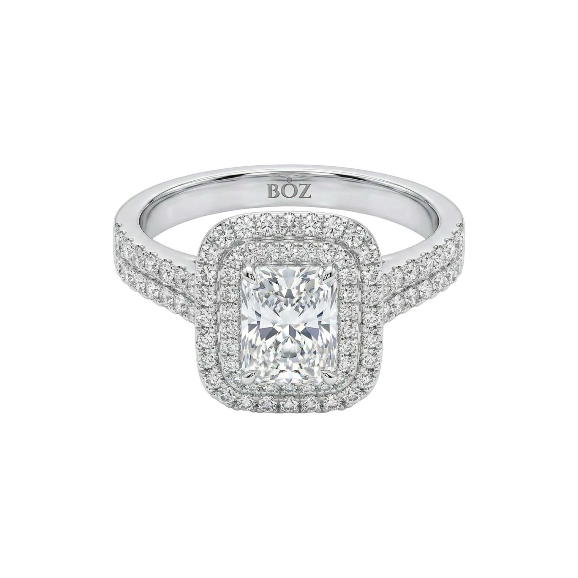 Silver ring with a diamond on a white background