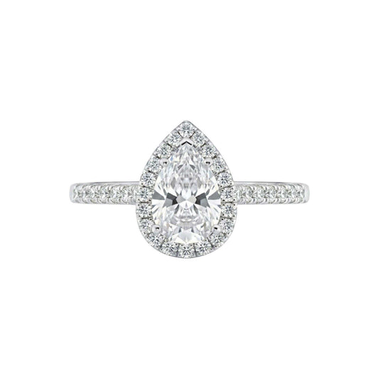 Diamond ring with pear-shaped center stone on a white background