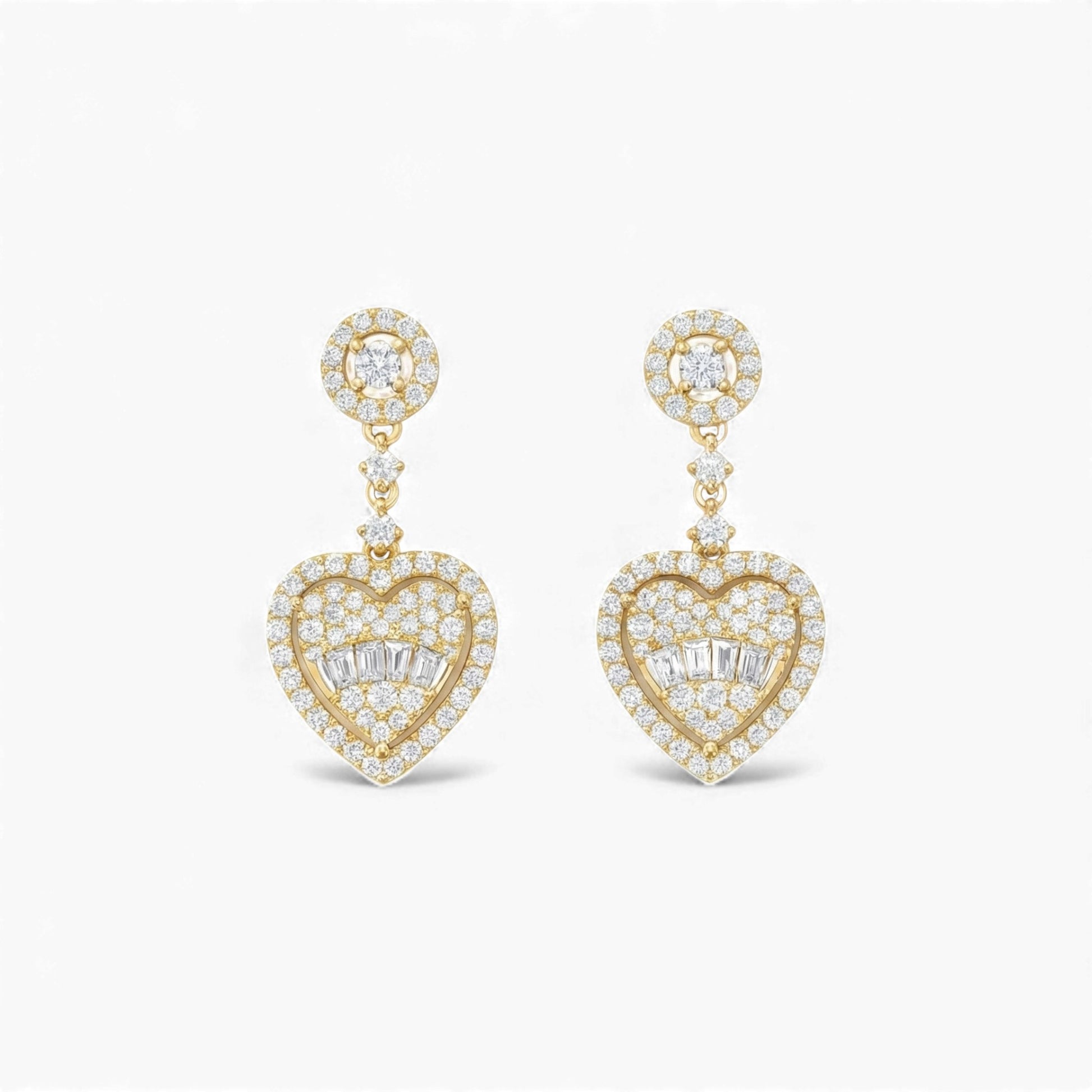 Heart-shaped earrings with diamond accents on a white background