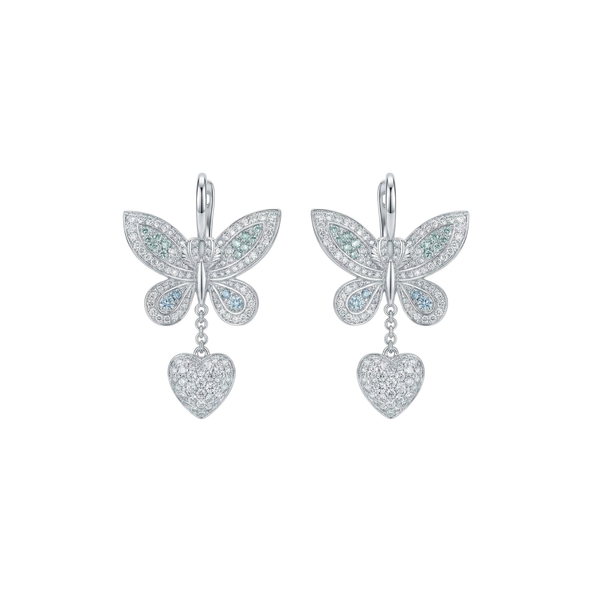 Butterfly earrings with heart pendants on a white background
