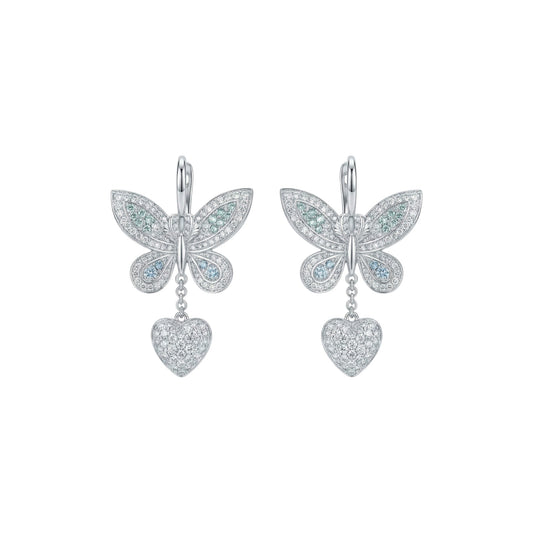 Butterfly earrings with heart pendants on a white background