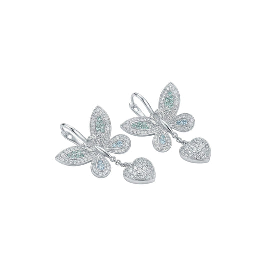 Butterfly-shaped earrings with gemstones on a white background