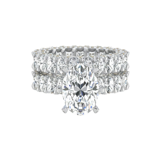Diamond ring with a pear-shaped center stone on a white background