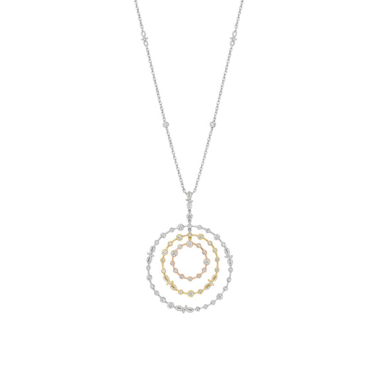 Necklace with a circular pendant featuring gold and silver chains on a white background