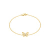 Gold bracelet with a butterfly charm on a white background