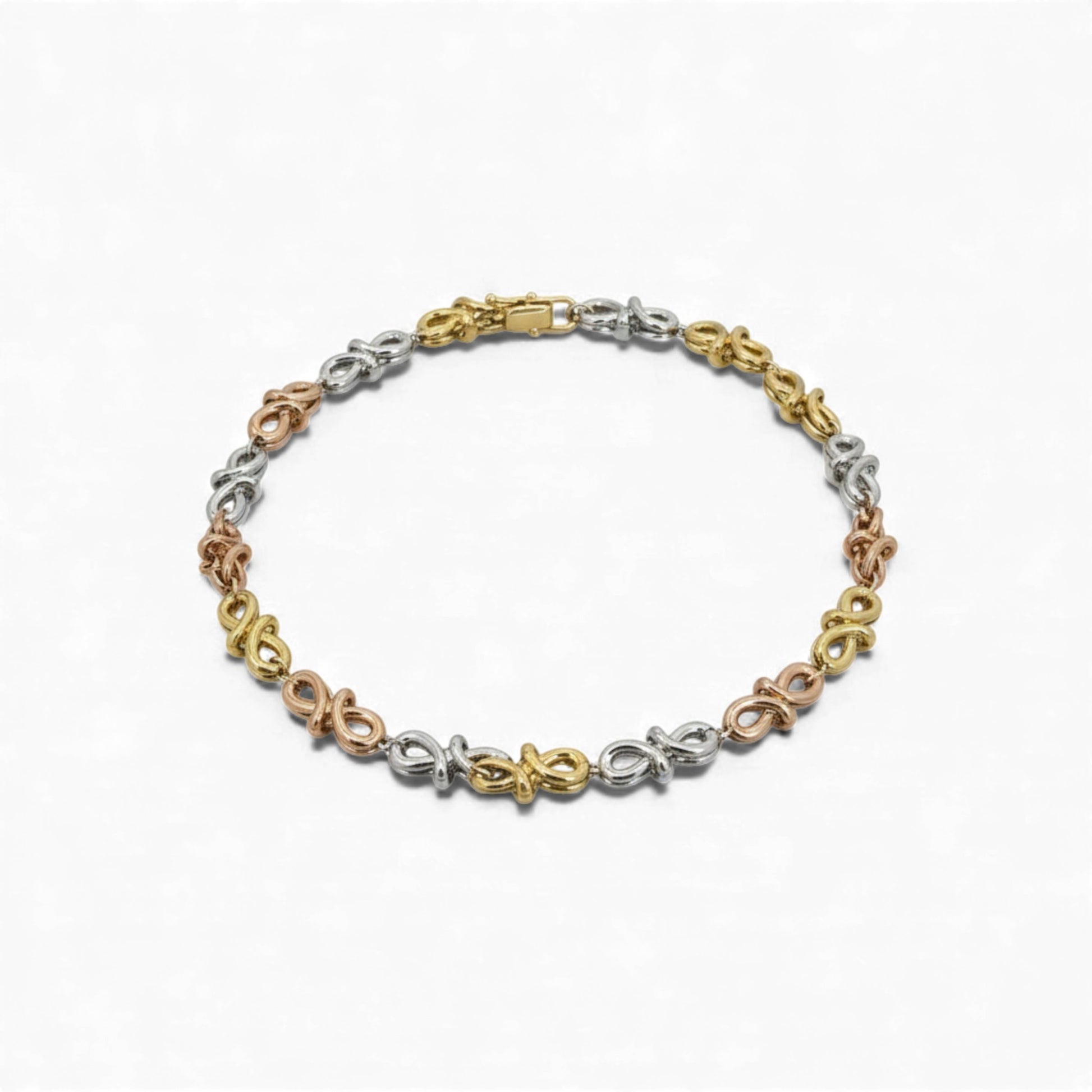 Tri-color bracelet with floral designs on a white background
