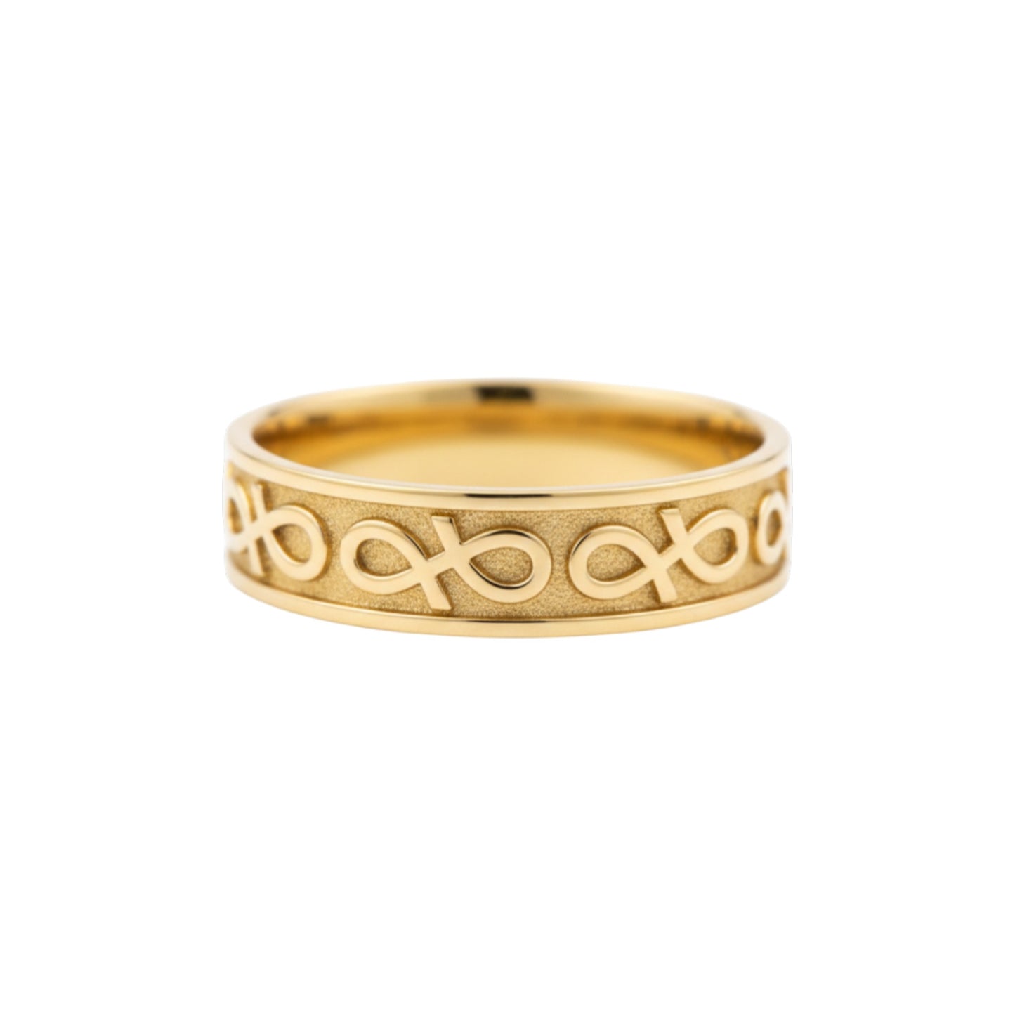 Gold ring with intricate design on a white background
