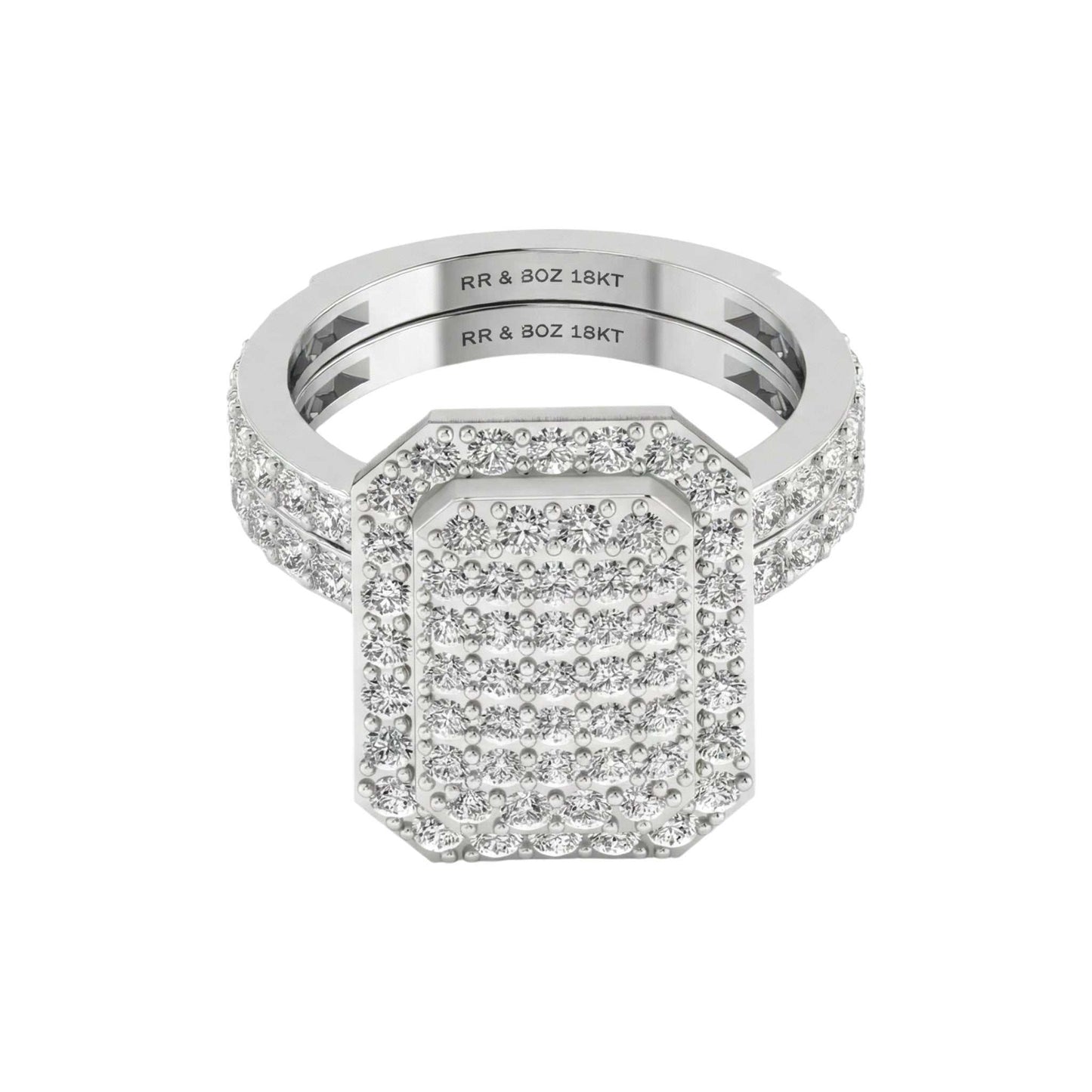 Silver ring with diamond accents on a white background