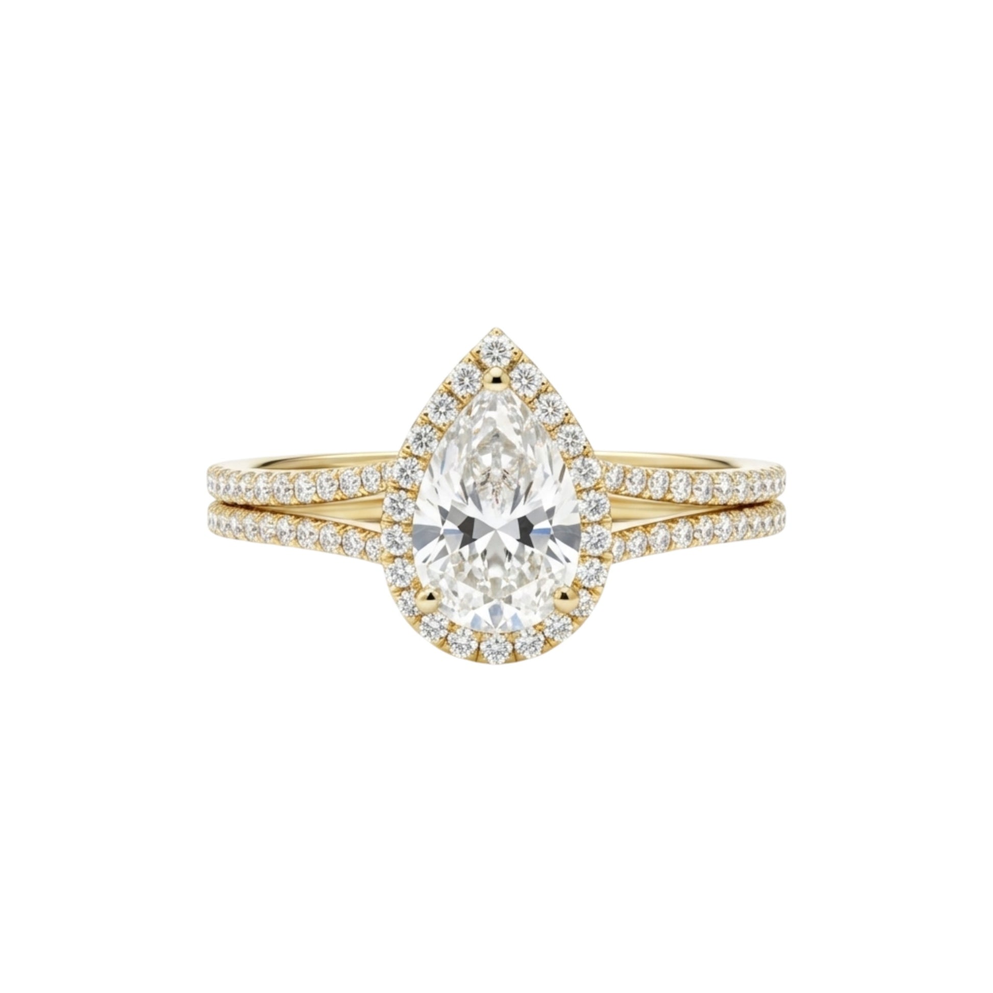 Gold ring with a pear-shaped diamond on a white background
