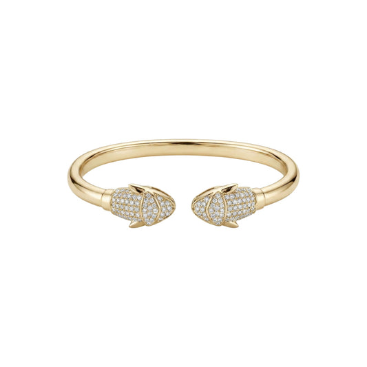 Gold bracelet with diamond accents on a white background