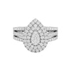 Lovely pear cut diamond cluster engagement ring in 18KT gold with triple-split pavé band and natural VVS clarity diamonds