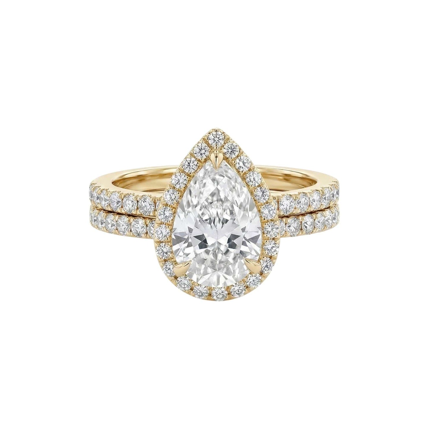 Ola Pear Cut Moissanite and natural diamond bridal set in 18KT gold ring with pavé diamond halo and matching band
