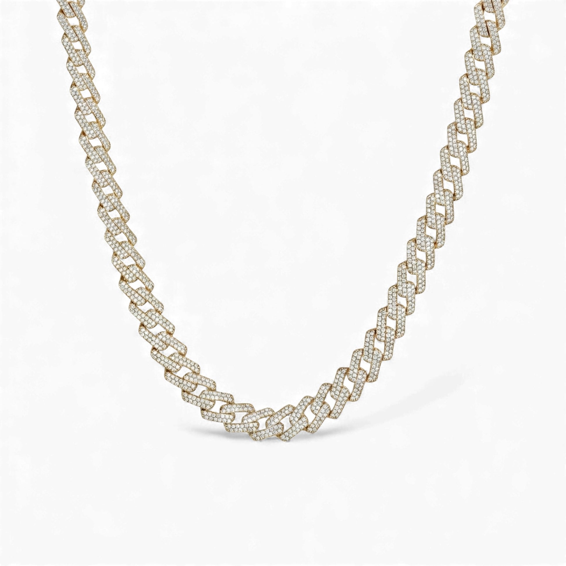 Gold chain necklace on a white background