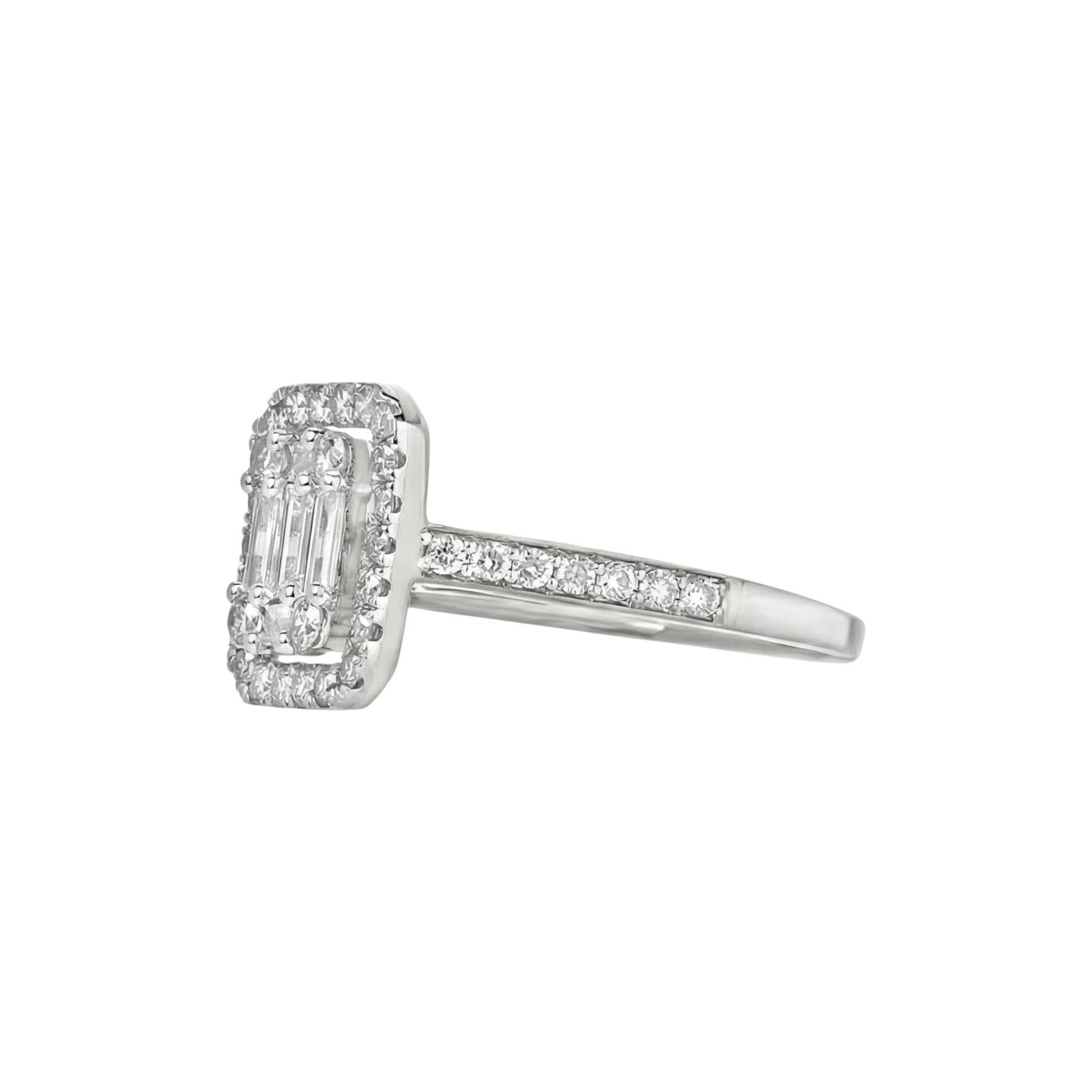 Silver ring with diamond accents on a white background