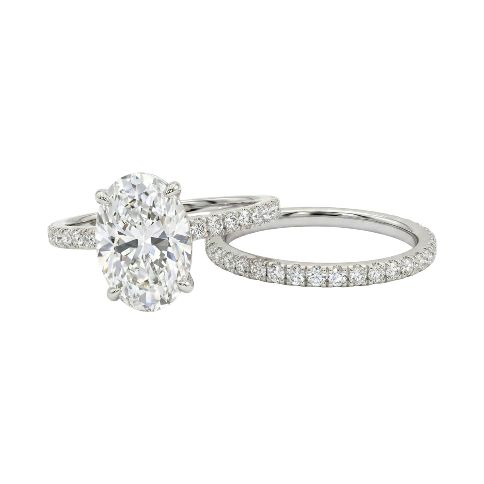 Diamond ring with a large central gemstone and smaller stones on a white background