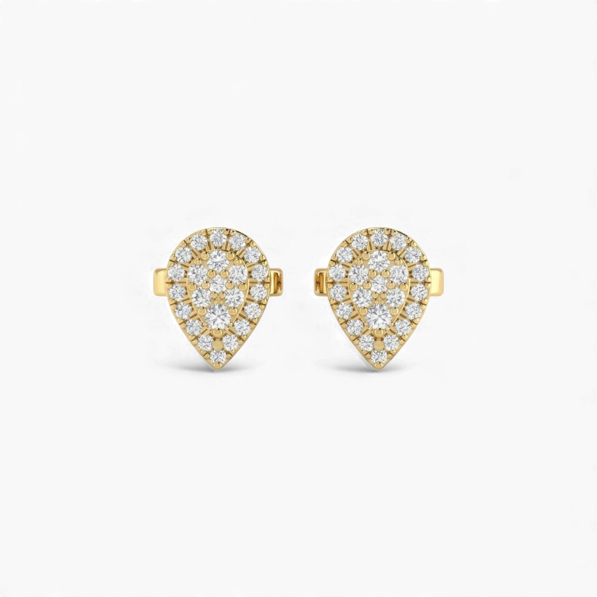 Heart-shaped gold earrings with diamond accents on a white background