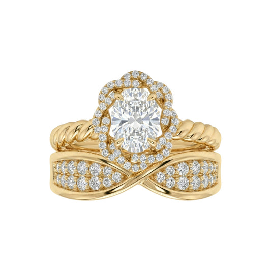 Gold ring with diamond accents on a white background