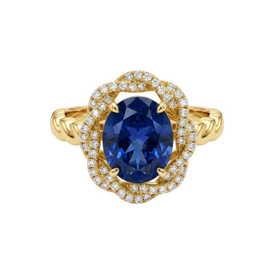Gold ring with a blue gemstone and diamond accents on a white background