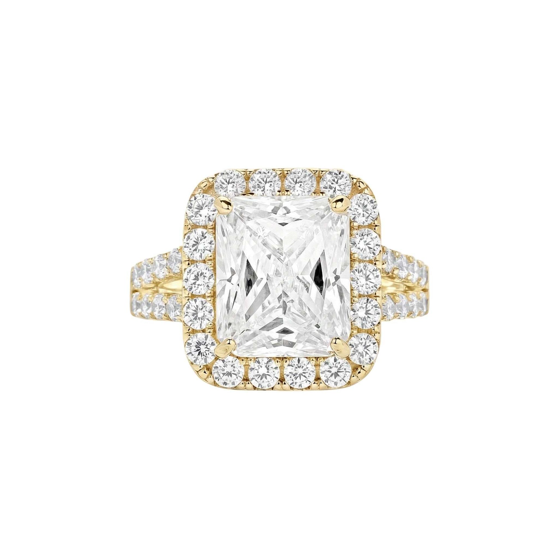 Zoe Radiant Cut CZ engagement ring with radiant cubic zirconia, halo setting, and split pavé 18KT gold band