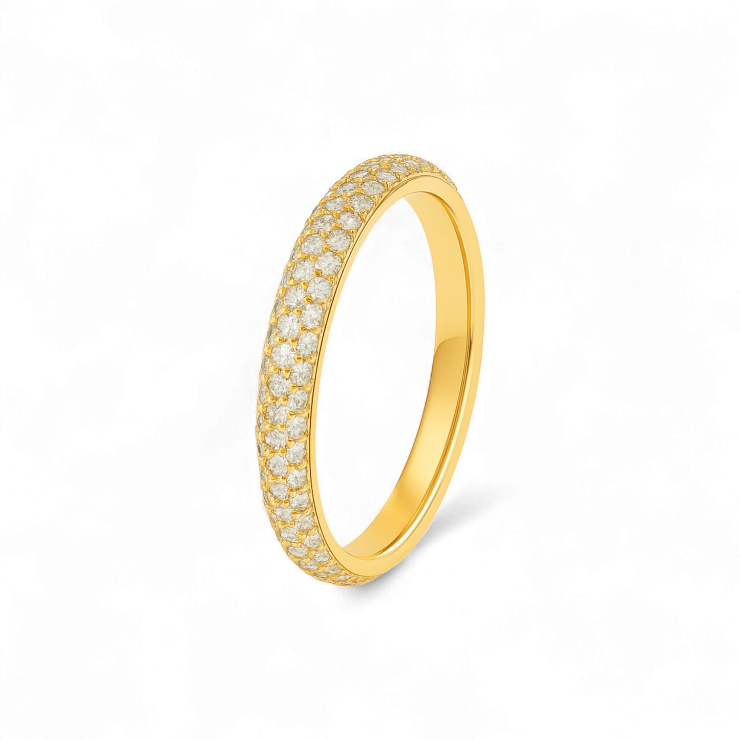 Gold ring with embedded diamonds on a white background
