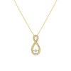 Gold infinity pendant necklace on a white background