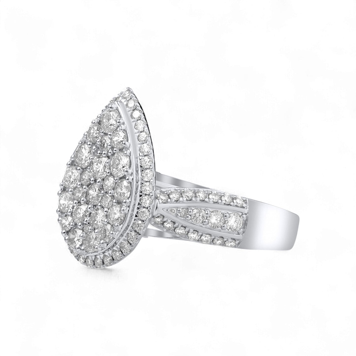 Silver ring with a teardrop-shaped diamond cluster on a white background