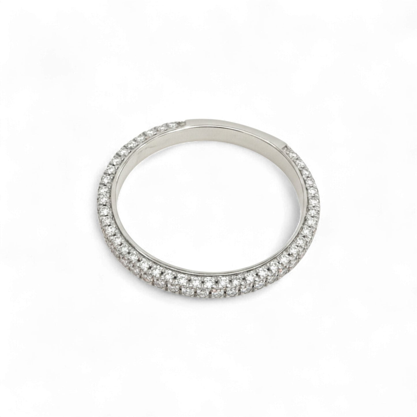 Silver ring with small stones on a white background