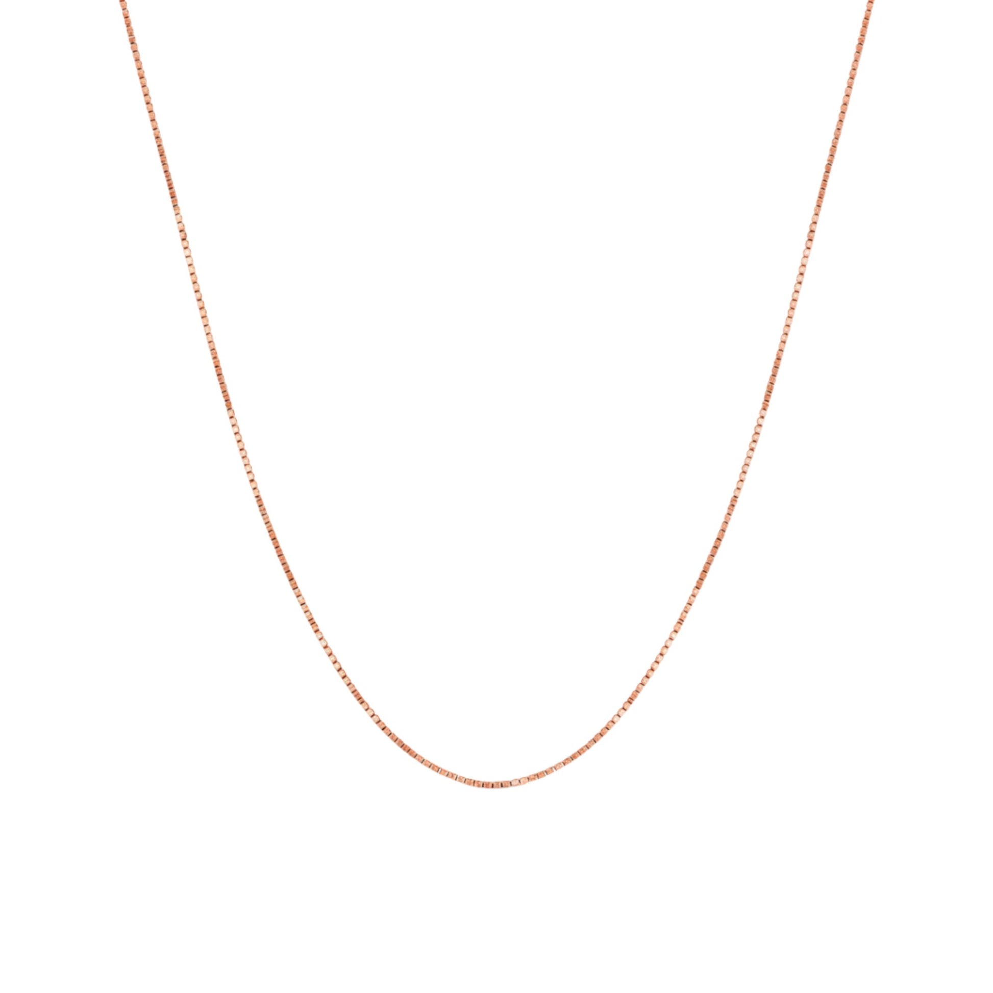 Rose gold chain on a white background